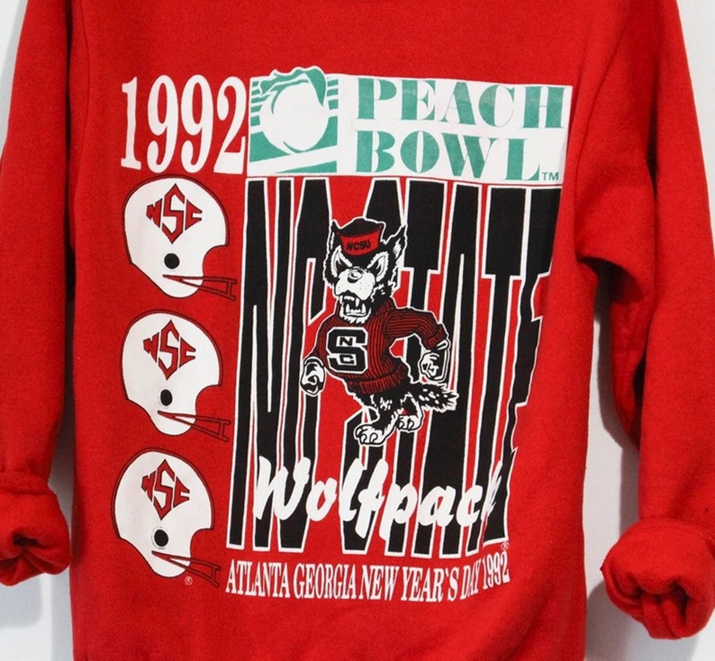 Vintage North Carolina State University Wolfpack 1992 Peach Bowl Crewneck Sweatshirt, North Carolina Shirt for NCAA Fans - Image 2