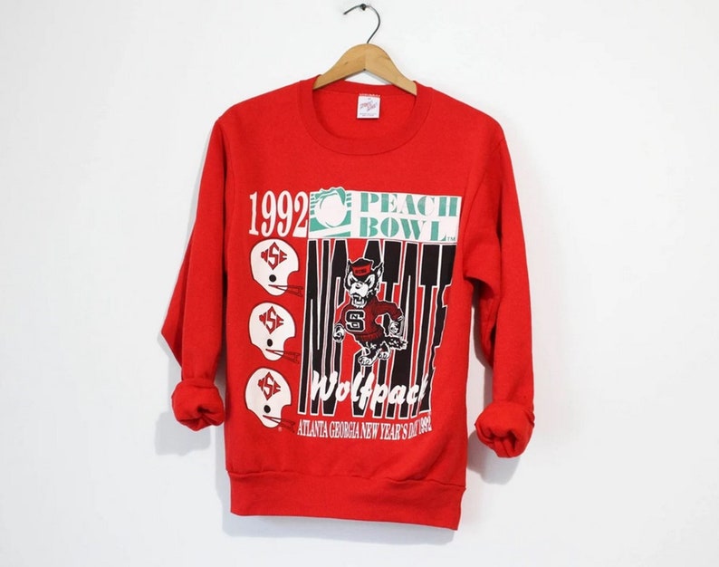 Vintage North Carolina State University Wolfpack 1992 Peach Bowl Crewneck Sweatshirt, North Carolina Shirt for NCAA Fans