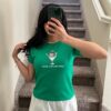 St. Patrick's Day Baby Tee for Women - Leprechaun Martini Cocktail Drinks Well with Others Funny St. Paddy Tee