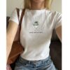 St. Patrick's Day Baby Tee for Women - Leprechaun Martini Cocktail Drinks Well with Others Funny St. Paddy Tee